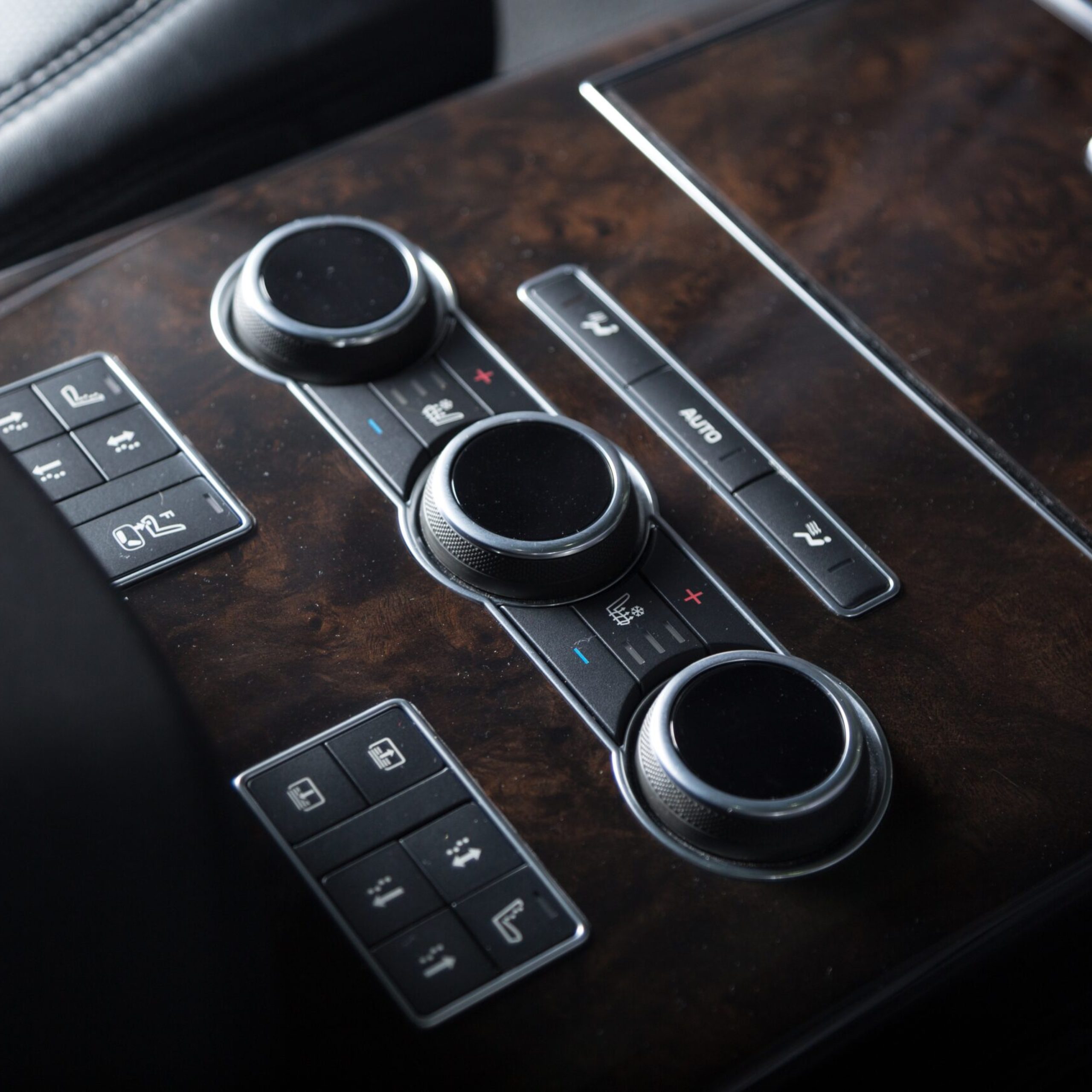 A closeup shot of interior details of a modern luxury car